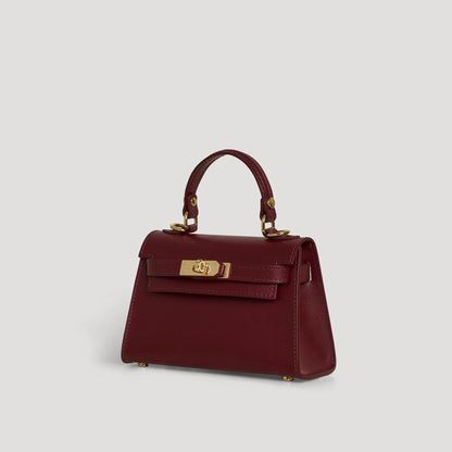 Diana S top-handle bag in hammered leather burgundy red — three-quarter view
