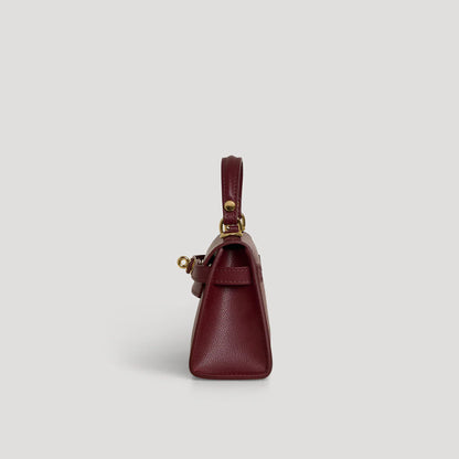Diana S top-handle bag in hammered leather burgundy red — side view