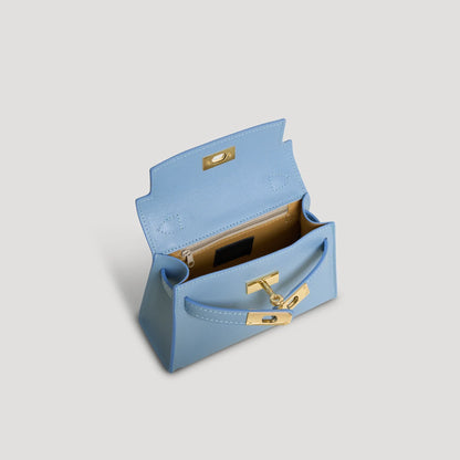 Diana S top-handle bag in hammered leather sky blue — interior view with microfiber lining and zipped pocket