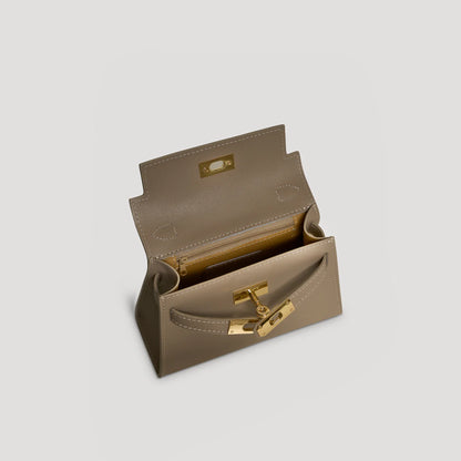 Diana S top-handle bag in hammered leather dove grey — interior view with microfiber lining and zipped pocket